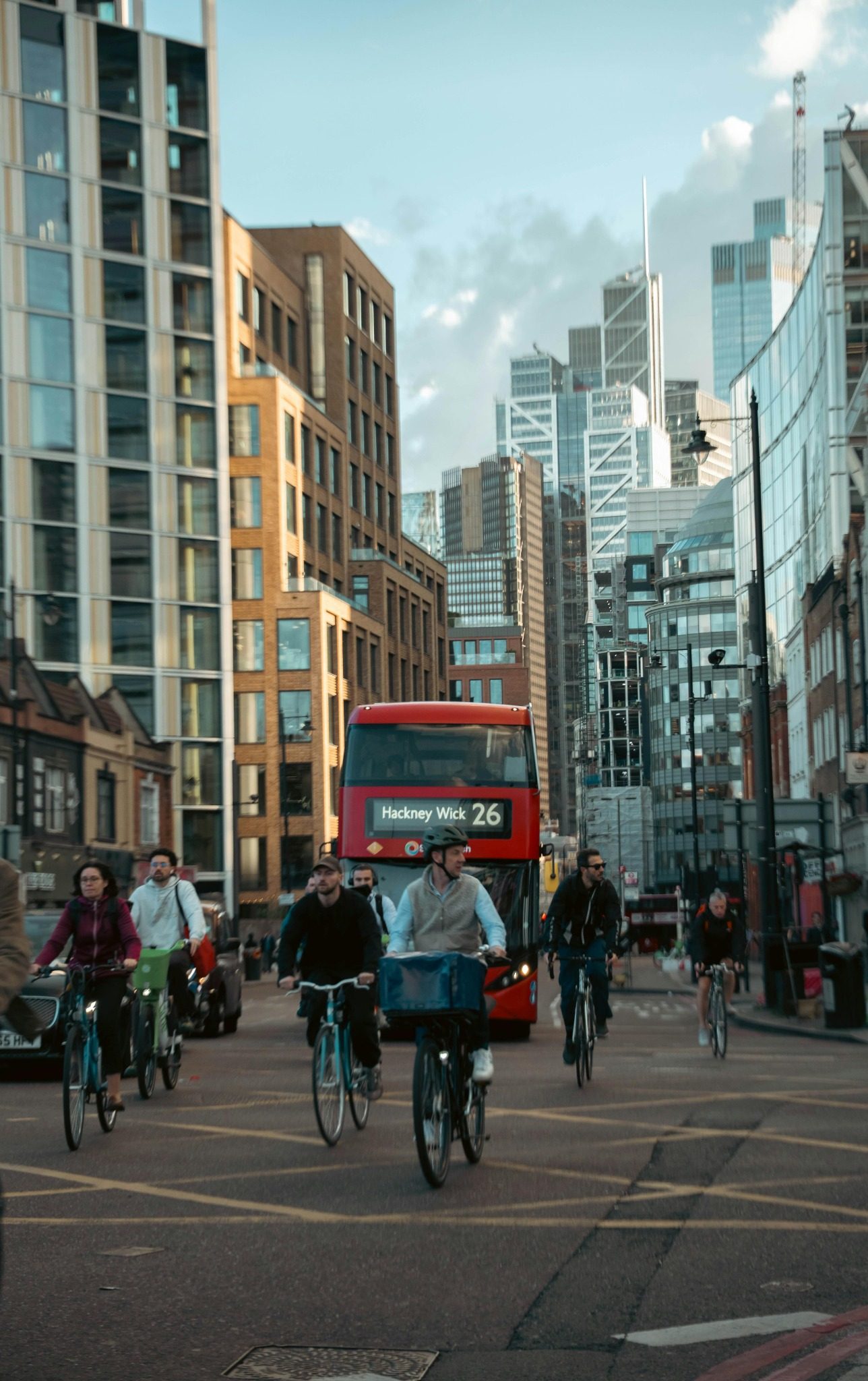 Cyclists and buses in London under clean air regulations